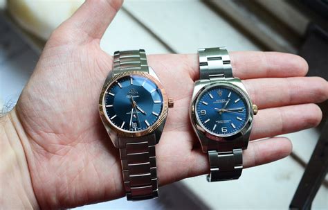 omega globemaster vs rolex oyster perpetual